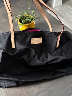 Rare Kate Spade New York black duffle bag with hot pink interior